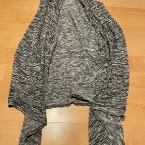 Used sweater vest/wrap black and white made by papaya size large
